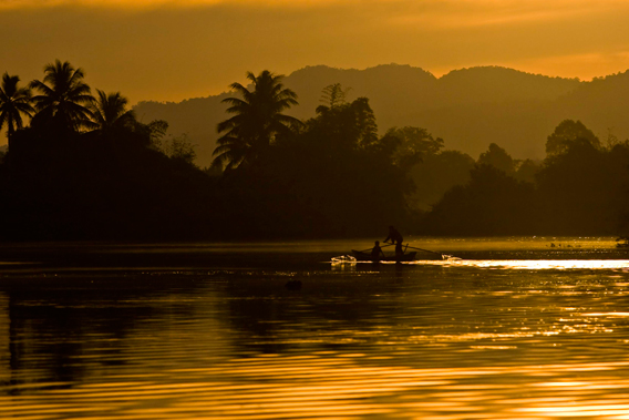 Chi Phat's main river at sunset. Photo courtesy of Suwanna Gauntlett.