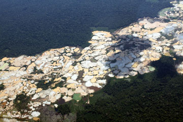  Aerial view of Amazon rainforest landscape scarred by open pit gold mines. Photo by: Rhett A. Butler. 