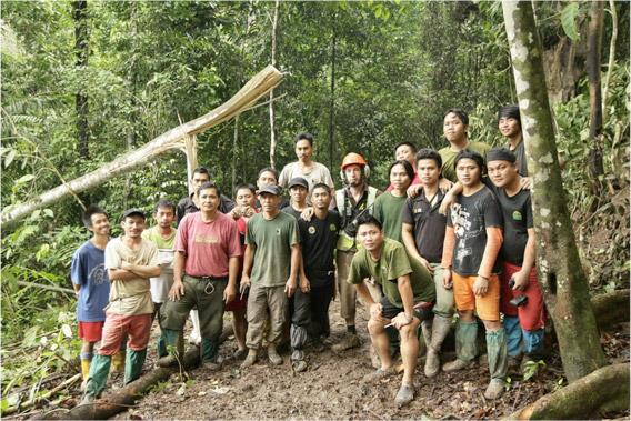 Rhino heroes: having run out of food except for instant noodles, the trap site team pose for a photo before the airlift on morning of 25 December 2011. Photo by: © Azrie Alliamat/ITBC, Universiti Malaysia Sabah. 