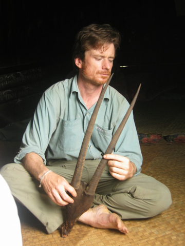 William Robichaud in the Annamite Mountains with saola horns. Photo courtesy of William Robichaud. 