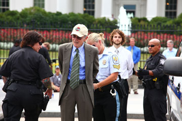 A man is arrested in front of the White House.