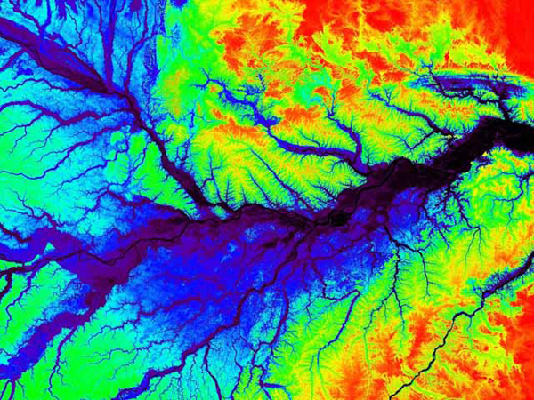 	A topographic map of a section of the central Amazon River Basin near in Manaus, Brazil. Dark blue indicates channels<br>
		that always contain water, while lighter blue depicts floodplains that seasonally flood and drain, and green represents<br>
		non-flooded areas. Image courtesy of the Global Rain Forest Mapping Project.