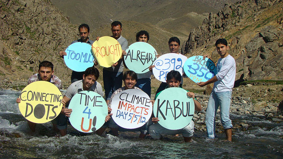 Paghman Valley, Afghanistan. A group of young people gathered where the Kabul river flows down from the Paghman Valley in an effort to show the how low the water table is. Afghanistan faces considerable drought and water shortage as a result of climate change. Photo courtesy of: 350.org.