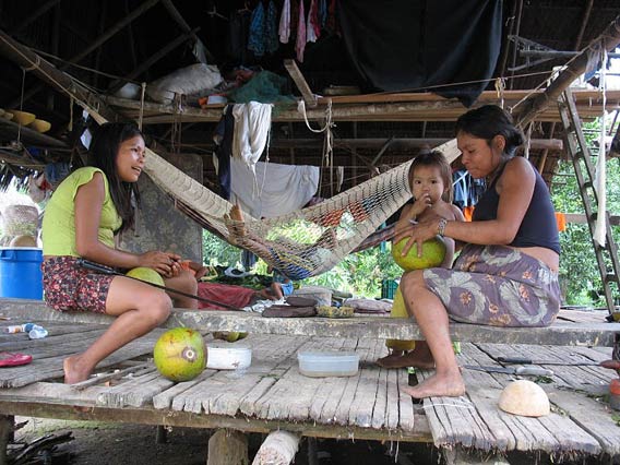  An Achuar family in a village nearby oil operations in Block 1-AB. Photo courtesy of: Amazon Watch.