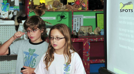 Carter and Olivia Ries give a presentation about rhino poaching at the Cochran Mill Nature Center in Palmetto, Georgia. Photo courtesy of OMG.
