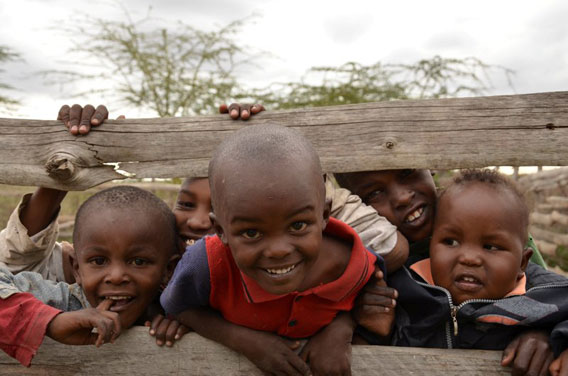 These children's parents have enlisted in a program where their 100 acres will remain unfenced, no subdivisions no land sales, no retaliatory killings of wildlife in event of predation, in return for $4/acre! It generates the little income that allows these kids to go to school. For now these payments allow the Maasai to retain their pastoral way of life, but in the medium and long term it will not compete with value of the land for development, quarrying or many other land uses.  Photo by: Paula Kahumbu