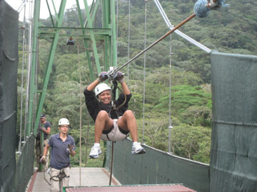  Ziplining is a popular tourist activist in Costa Rica. Here tourists zipline near Arenal National Park. Photo by: Katharine Sims. 
