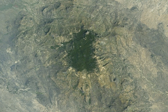  Forest loss along the edge of Mount Dongotomea in South Sudan is visible from Google Earth.